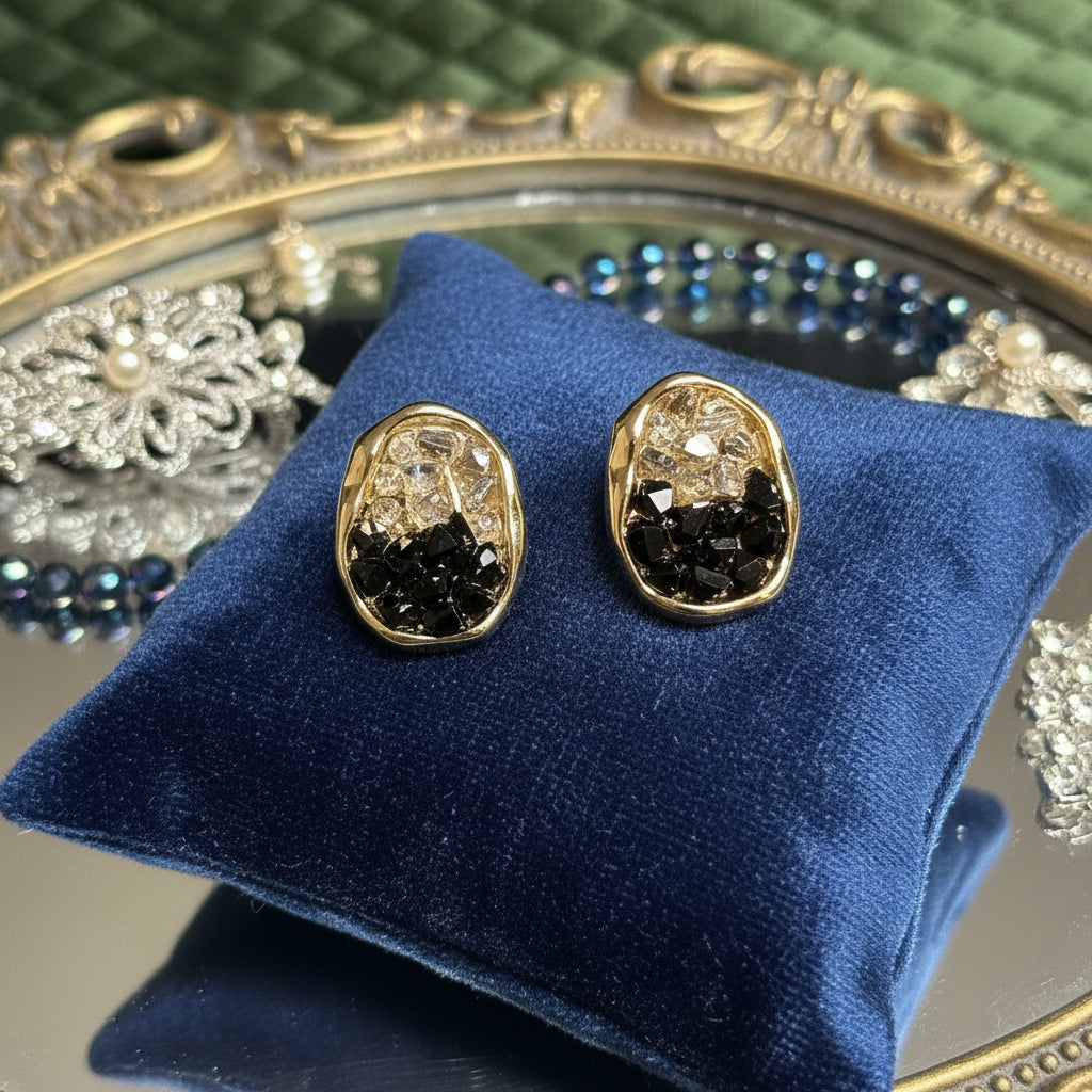 Gold Oval Stud Earrings featuring Raw Black and Clear Crystals