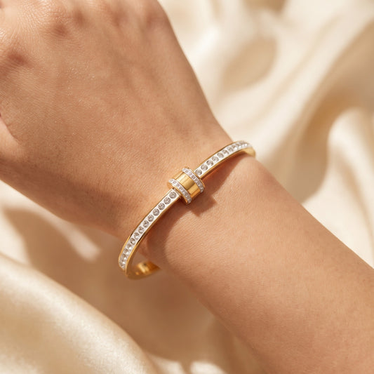 Gold Bangle Bracelet with Sparkling Diamond Bar Detail
