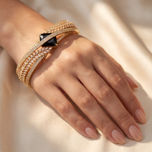 Luxurious Gold Bangle with Geometric Black Stone & CZ Accents