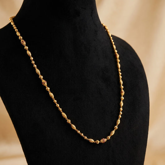 Gold Plated Long Chain Necklace with Textured Beads & Red Accents