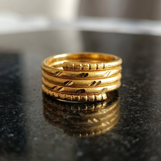 Elegant Gold Stacked Ring with Multi-Textured Bands